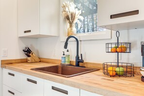 Fridge, microwave, stovetop, coffee/tea maker - Private Hot Tub: Waterfront Home along Eagle River (Eagle River)