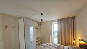 1 dormitorio, tabla de planchar con plancha, wifi gratis y ropa de cama