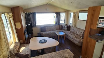 Cabin | Living area | TV, fireplace