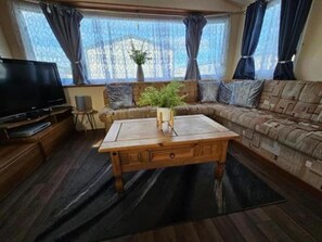 Cabin | Living area | TV, fireplace