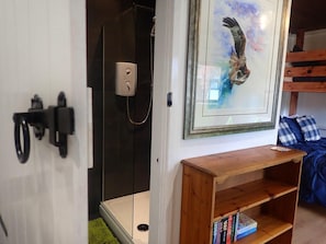 Cabin | Bathroom | Shower, towels - Tranquil Lodge Retreat in Penegoes (Machynlleth)