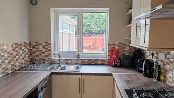 Microwave, dishwasher, cookware/dishes/utensils