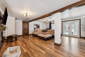 Smart TV, fireplace, books, printers