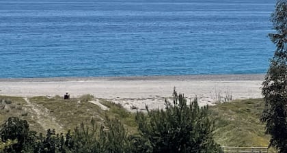 Apartment in front of the sea