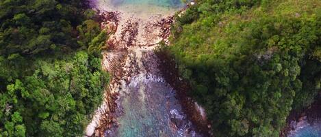 Beach nearby, white sand, beach shuttle, 20 beach bars