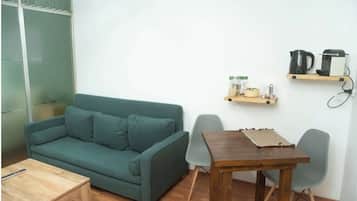 Apartamento | Área de estar | TV de tela plana