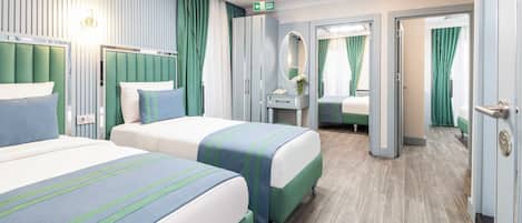 Superior Suite | 2 bedrooms, in-room safe, laptop workspace, blackout drapes