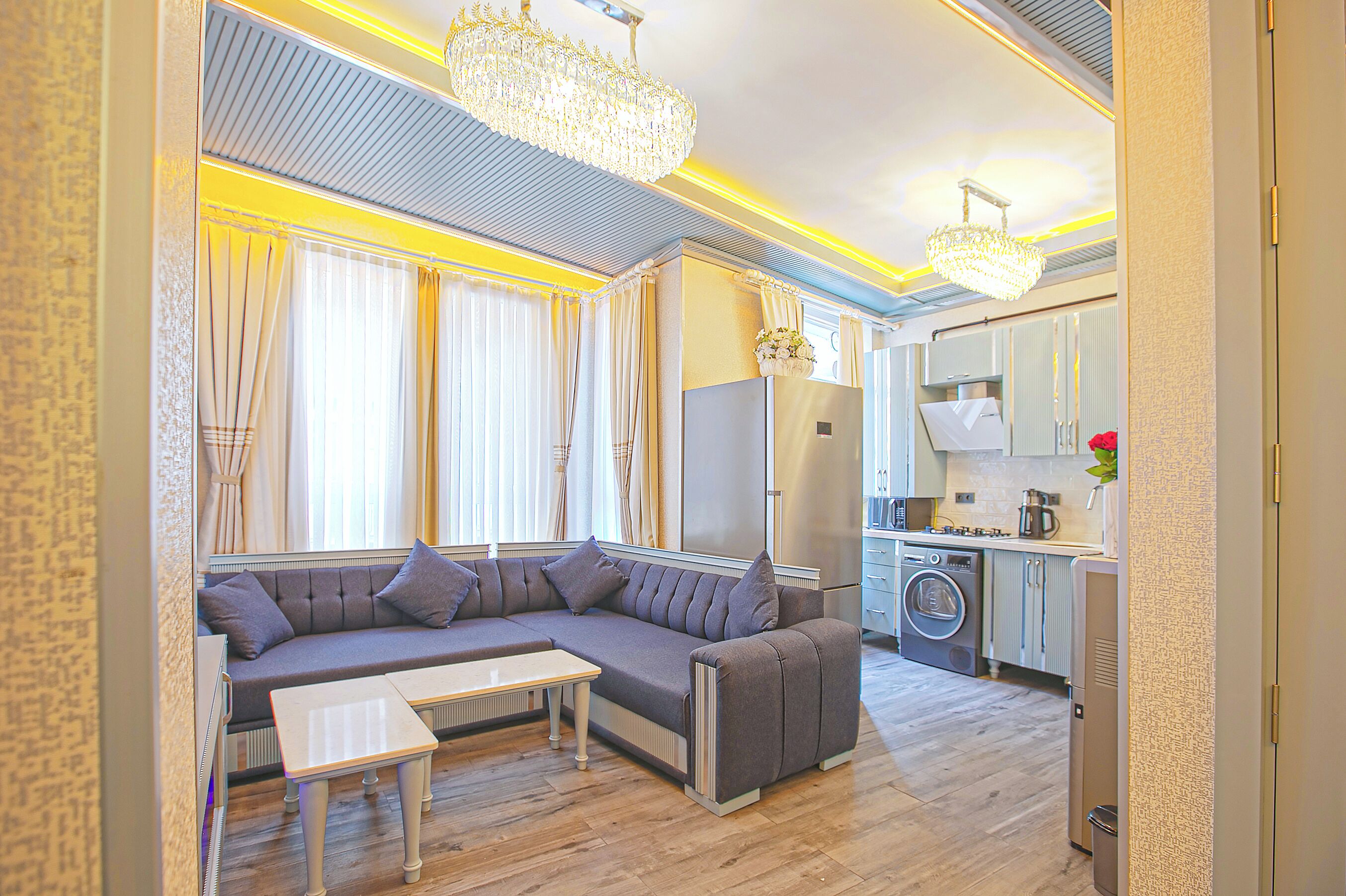 Design Apartment | Living area | 90-inch LED TV with satellite channels, iPad, video game console