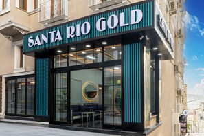 A modern hotel facade with a prominent sign reading "Santa Rio Gold." - Santa Rio Gold Taxim (Istanbul)