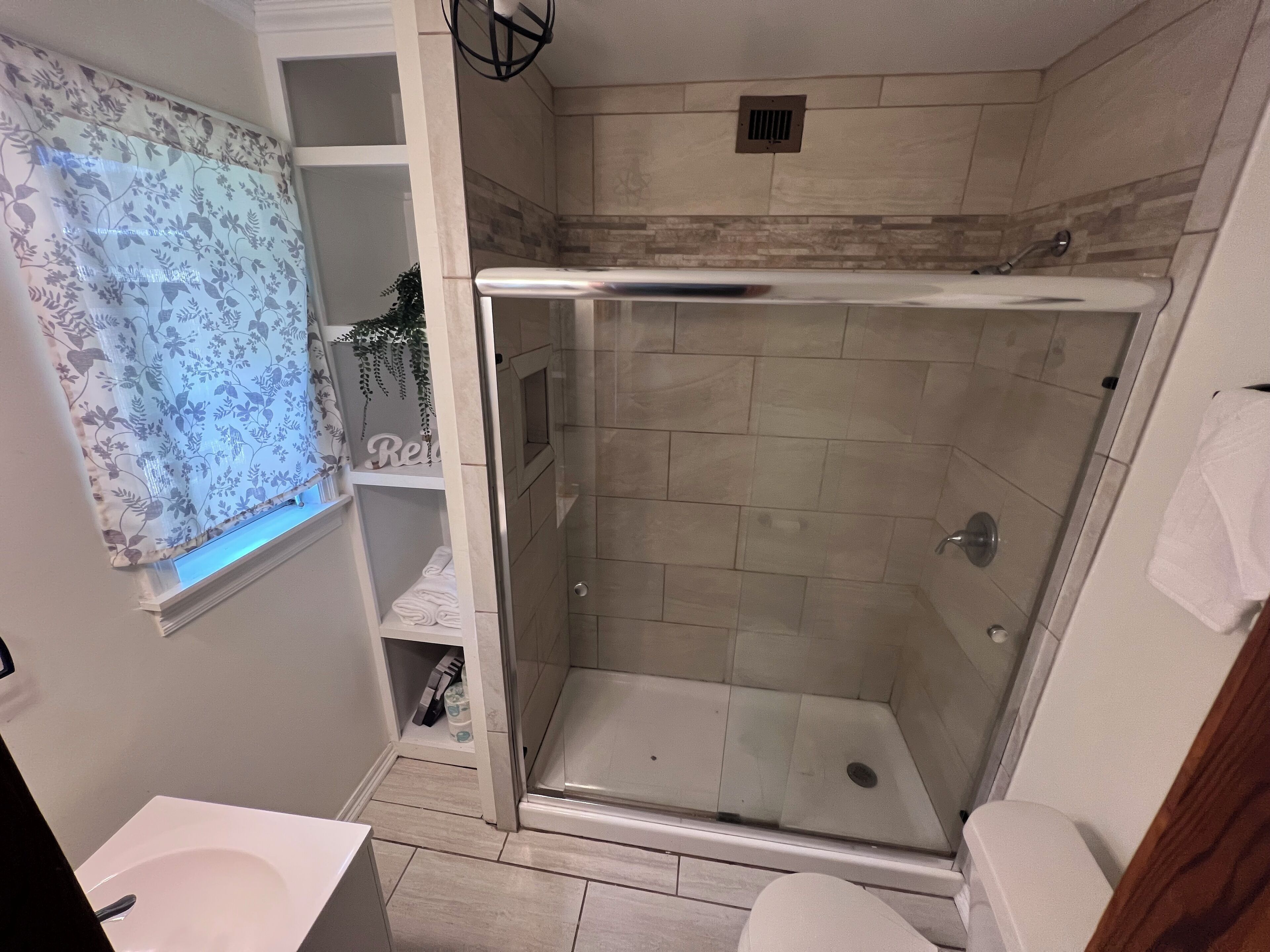 Shower, towels, soap, shampoo