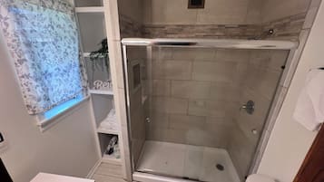 Shower, towels, soap, shampoo
