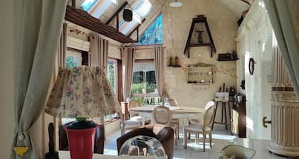 Maison d'hÎtes 'Suite Confort' avec terrasse privée, jardin partagé et Wi-Fi