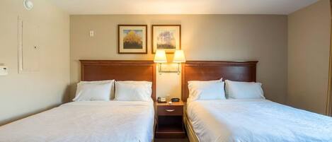 Studiosuite, 2 queensize-senger | Oppholdsområde | En 32-tommers Flatskjerm-TV med Parabol-TV samt DVD-spiller og filmkjøp