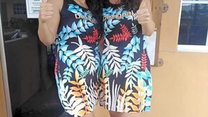 A person wearing a dress with a colorful leaf pattern. - Collection O Langkawi near pantai cenang formerly tokman inn (Langkawi)