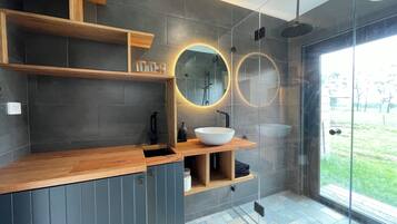 Shower, hair dryer, towels, soap