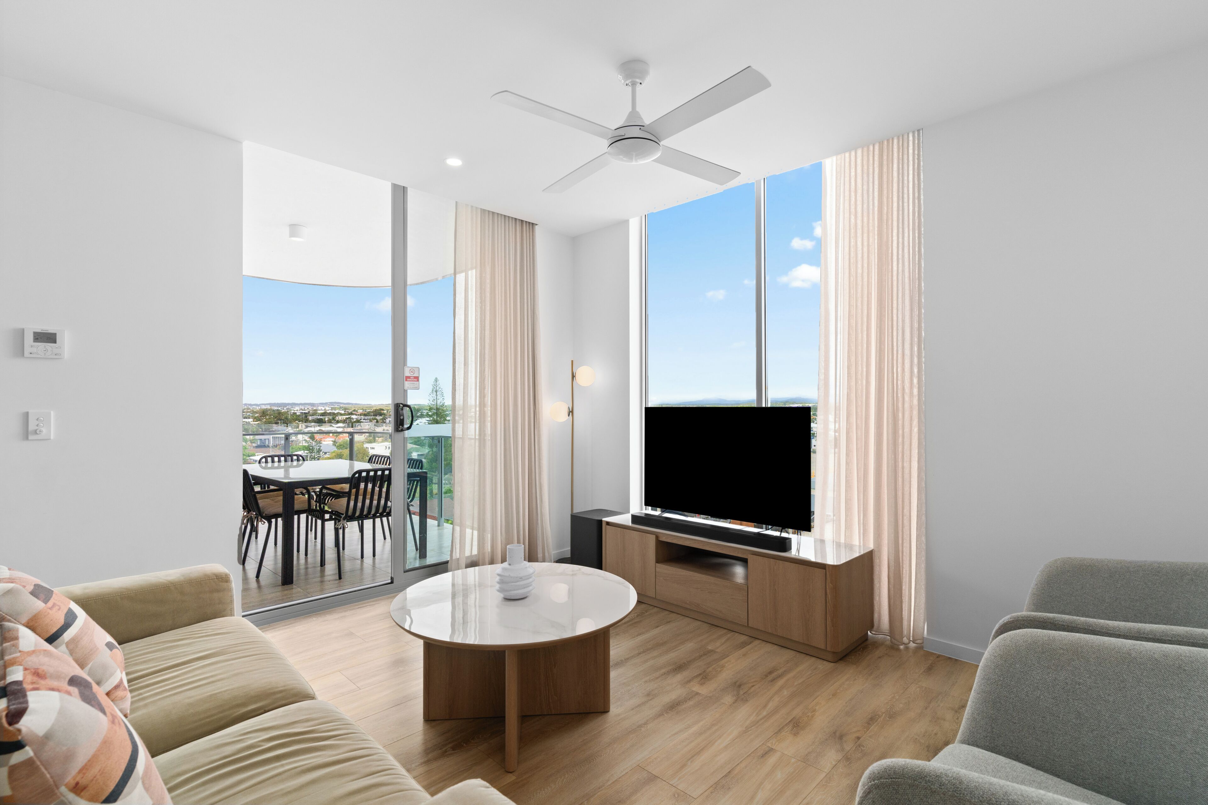 Two Bedroom Deluxe Apartment | Living area | 50-inch Smart TV with digital channels