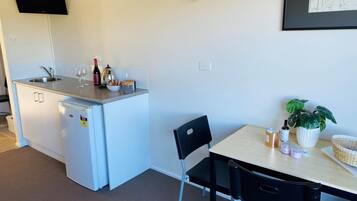 Fridge, microwave, cookware/dishes/utensils