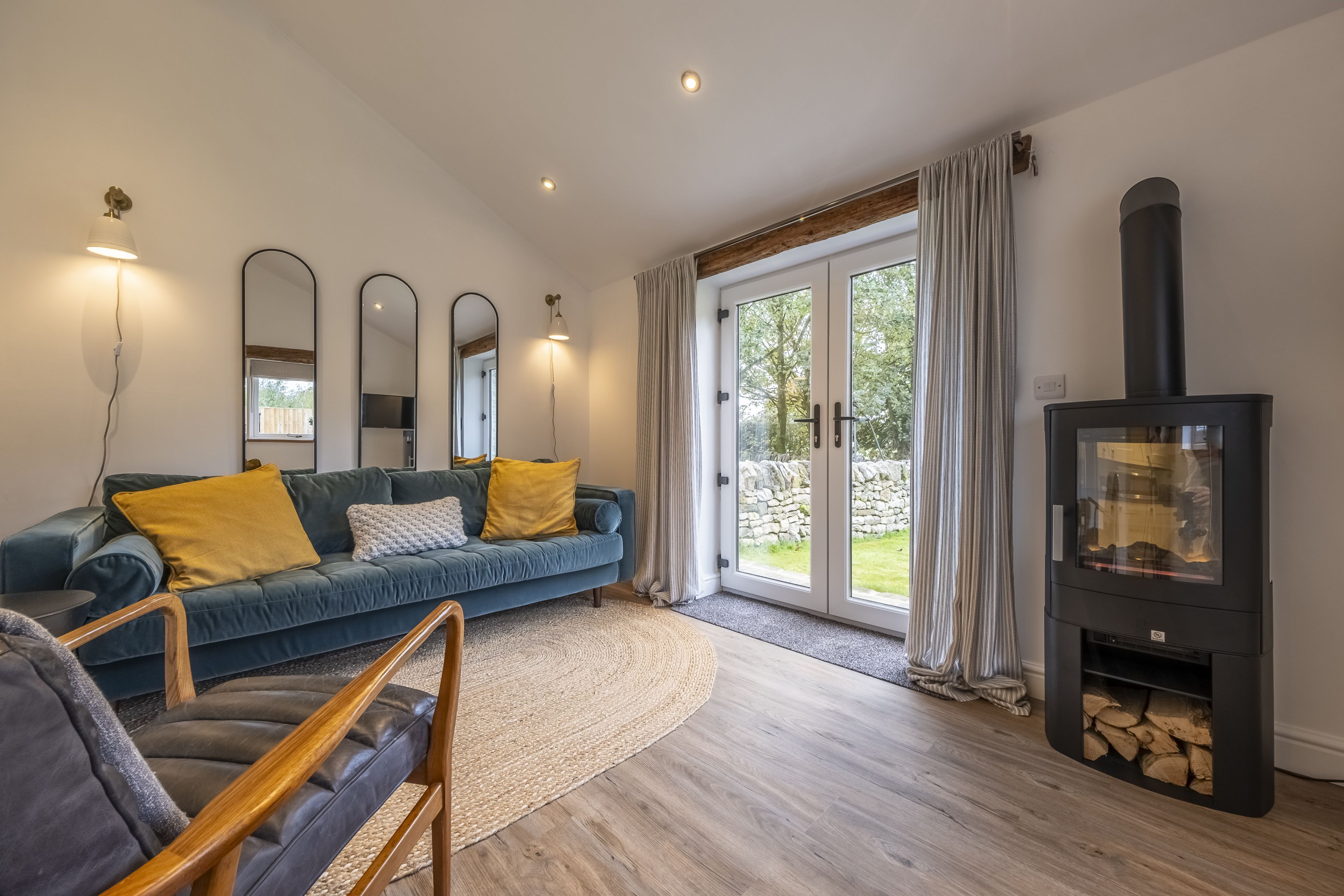 The Old Hen Shed: The cosy sitting room boasts a wood burning stove
