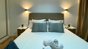 1 dormitorio, tabla de planchar con plancha, cuna de viaje y wifi gratis