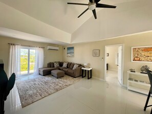 Smart TV - Newly Built 2-Bedroom Villa Short Walk From Beach & Minutes away from Airport! (Ramsey)