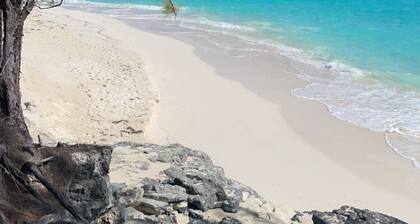 Newly Built 2-Bedroom Villa Short Walk From Beach & Minutes away from Airport!