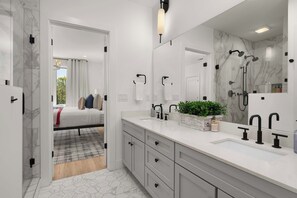 Shower, hair dryer, towels, shampoo