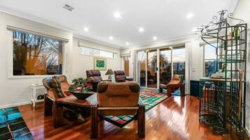 Family Townhome, Lake View | Living area | Flat-screen TV