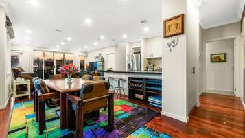 Family Townhome, Lake View | Living area | Flat-screen TV