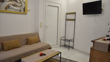 Departamento Deluxe, vista a la montaña | Área de sala de estar