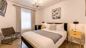 1 chambre, fer et planche à repasser, Wi-Fi, literie fournie