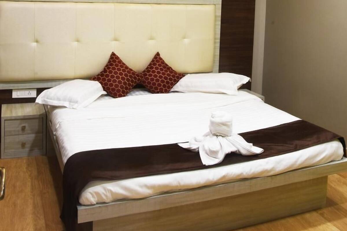 Habitación doble Deluxe, balcón | 1 habitación, wifi gratis y ropa de cama