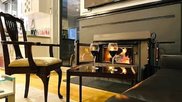 Casa Confort, vista al jardín | Área de sala de estar