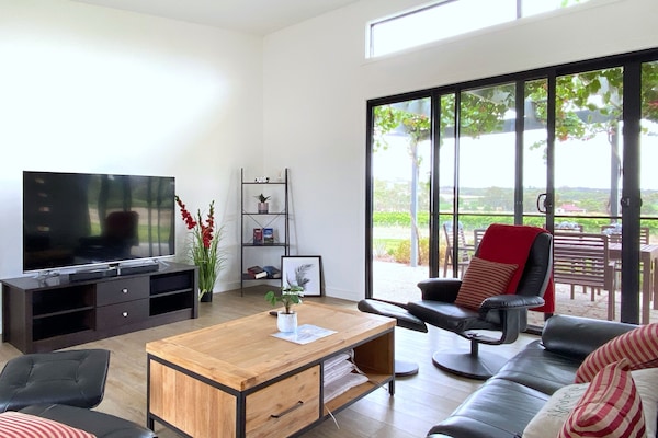 Comfort House, Garden View | Living area | Flat-screen TV