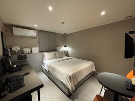 Hair dryer, slippers, towels, shampoo