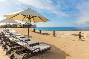 On the beach, sun-loungers, beach towels - Thanksgiving Week AMAZING Oceanfront Luxury Grand Solmar Land's End Master Suite (Cabo San Lucas)