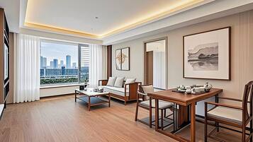 Signature Suite | In-room safe, desk, laptop workspace, blackout curtains