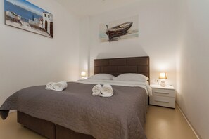 Family Apartment, 2 Bedrooms, Beach View, Beachfront | 2 bedrooms, free WiFi