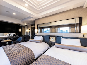 Deluxe Twin Room, Non Smoking | Down comforters, desk, blackout drapes, free WiFi