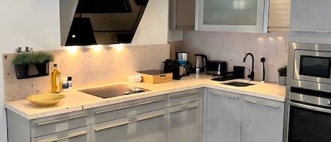 Fridge, microwave, dishwasher, coffee/tea maker