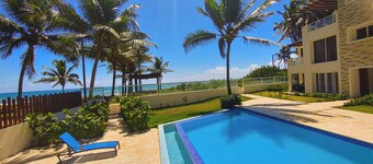 Nothing but Blue Skies and Endless Beach from this Comfortable Beachfront Condo