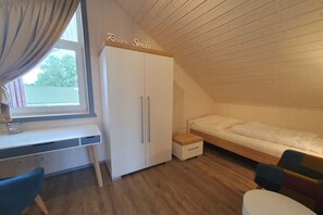 2 chambres, lit de bébé portatif