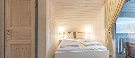 2 dormitorios y cuna de viaje