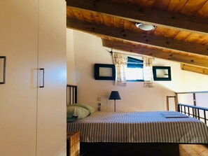 2 dormitorios, tabla de planchar con plancha, wifi y ropa de cama