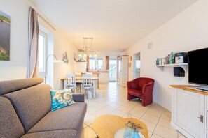 Una Smart TV, una chimenea