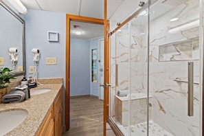 Eco-friendly toiletries, hair dryer, towels