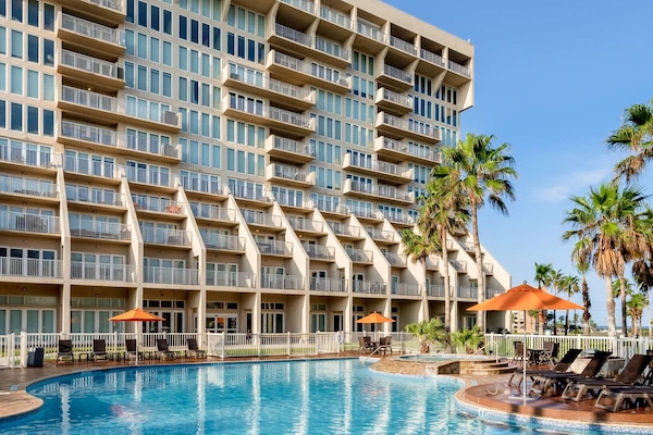 Relax in comfort with shallow seating right in the pool.