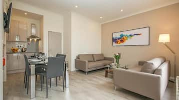 Apartment, 2 Bedrooms, Non Smoking, Kitchen | Living area | Flat-screen TV