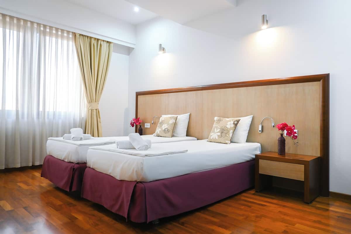 Double or Twin Room, City View | Blackout drapes, soundproofing, free WiFi