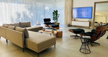 Royal Apartment, Multiple Beds, Garden View, Garden Area | Living room | TV, heated floors