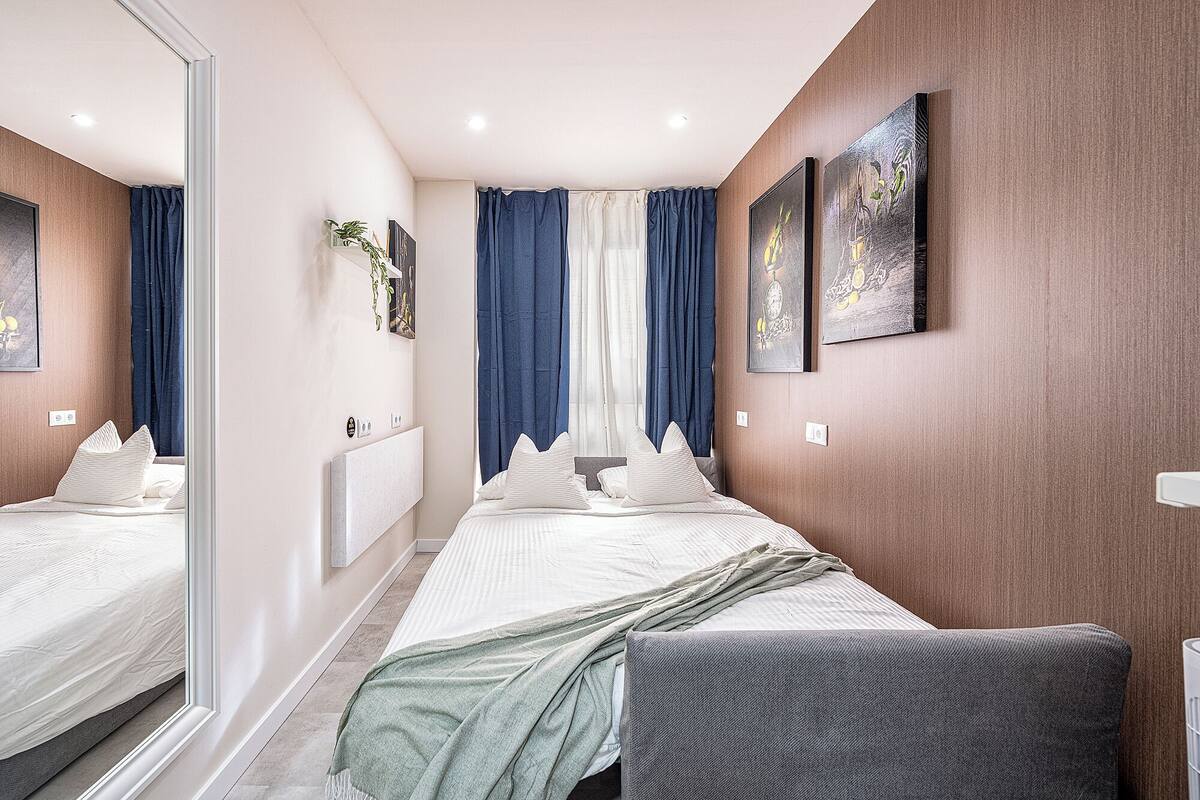 Desk, laptop workspace, blackout curtains, soundproofing